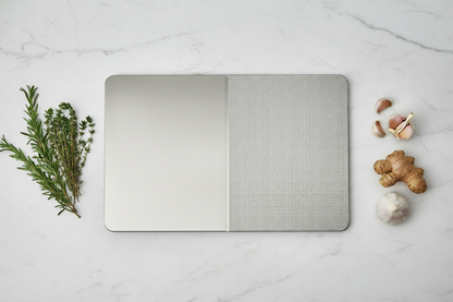 Double-sided titanium cutting board edge detail" / "Titanium cutting board with juice groove" / "Cutting board size comparison" / "Double-sided cutting board in use